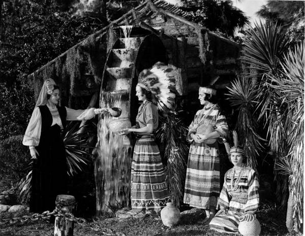 Young women drink at the Fountain of Youth at the Distant Drums premiere - Saint Augustine, Florida 