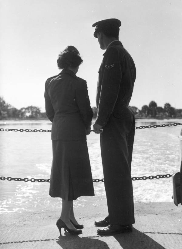 Honeymooners Lyn and Jim Agramonte on a ferry take a farewell look at the island - Sanibel Island, Florida
