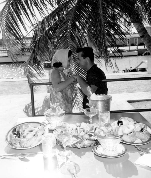 A couple chatting after ordering stone crabs and other dishes - Florida Keys, Florida
