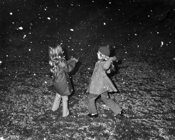 Liz Minerva, left, playing in the snow with Leslie Dughi in Tallahassee, Florida.