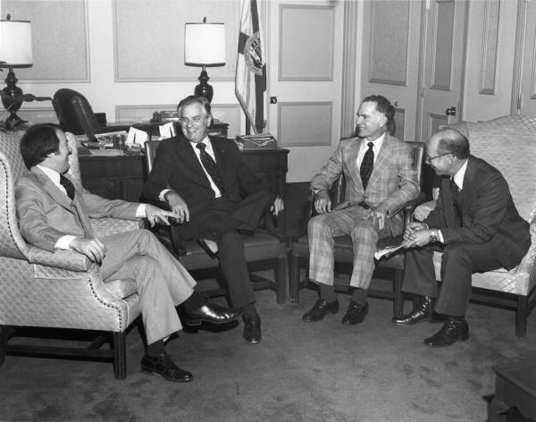 Men meeting with Lieutenant governor Wayne Mixson in Tallahassee, Florida.