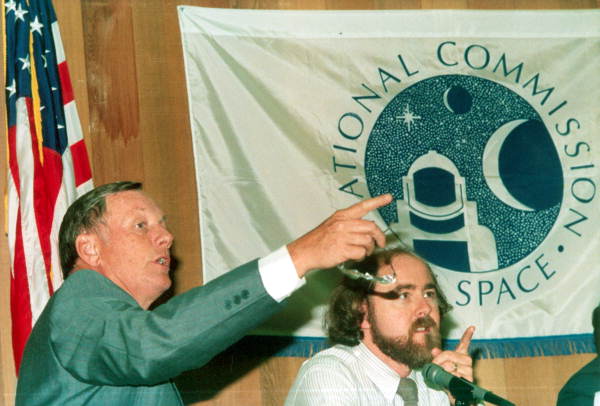 Neil Armstrong and Leonard David gesture during a meeting of the National Commission of Space - Tallahassee, Florida