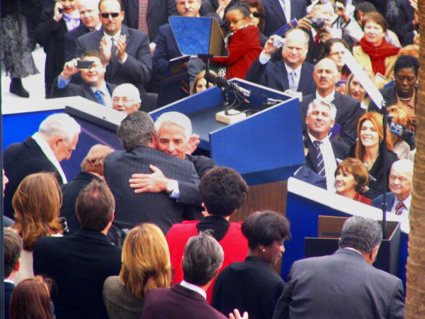 Governor Charlie Crist receiving a congratulatory hug from departing Governor Jeb Bush during his inauguration - Tallahassee, Florida
