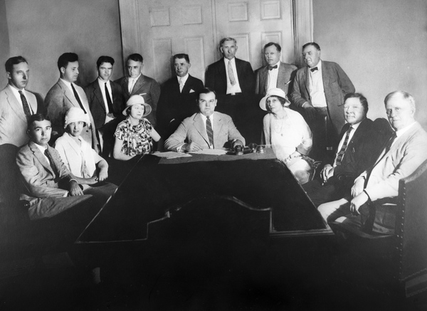 Group gathered around Governor John W. Martin for bill signing