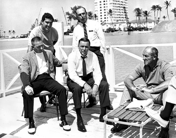 Frank Sinatra, in center, during filming of "Lady in Cement" - Miami Beach, Florida