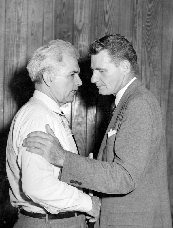 Florida Governor Caldwell conversing with former Florida Governor Holland 