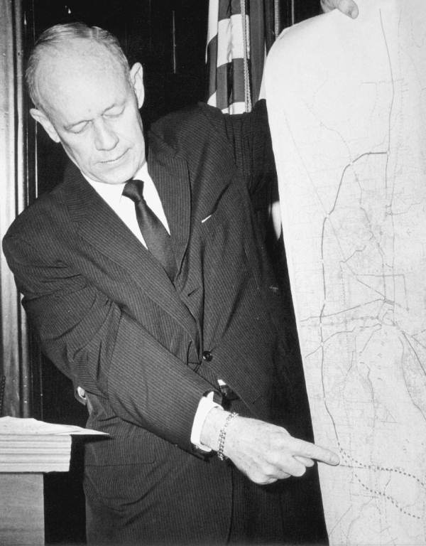 Florida Governor Farris Bryant pointing to a map