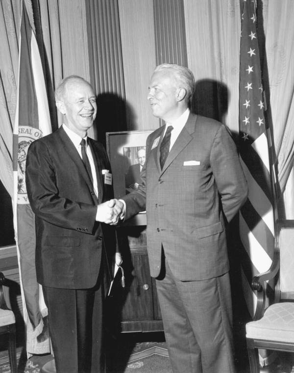 Florida Governor Farris Bryant shaking hands with a man