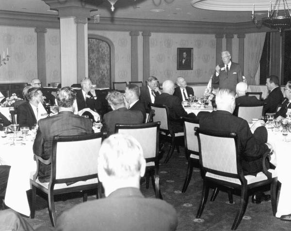 Florida Governor Farris Bryant and others listening to a speaker