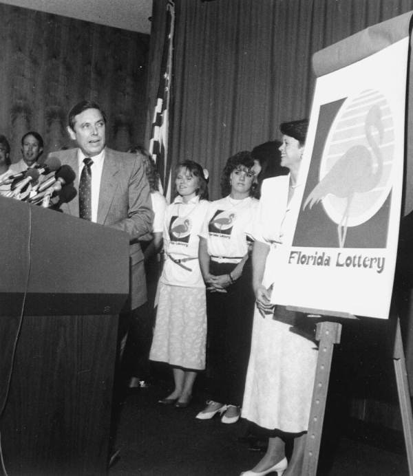 Florida Governor Robert Martinez unveiling a new lottery logo