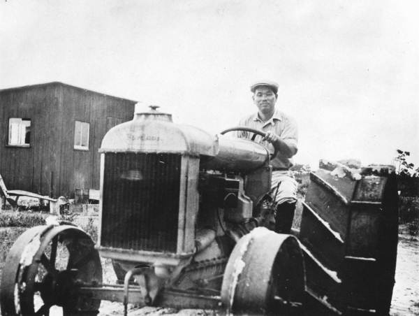 Hideo Kobayashi on tractor - Yamato, Florida