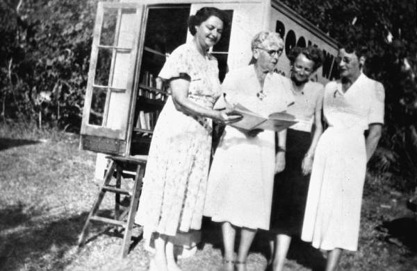 Marjory Stoneman Douglas beside the Miami LIbrary's Bookmobile