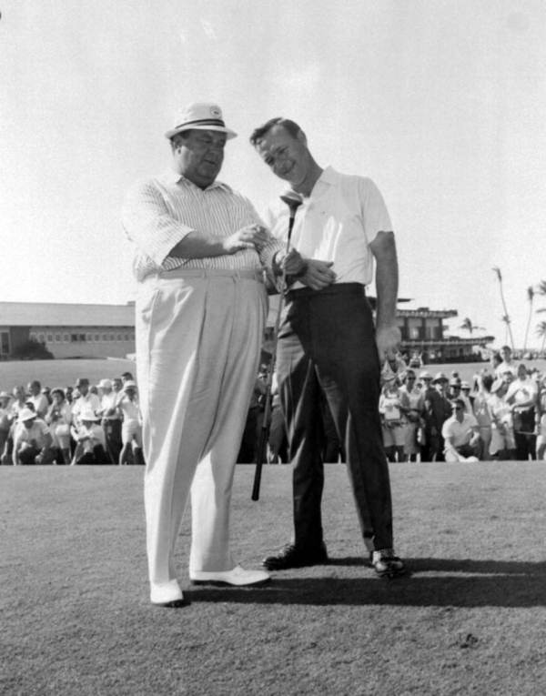 Jackie Gleason and Arnold Palmer at a golf match