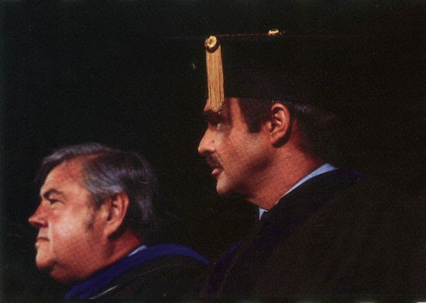 Burt Reynolds receiving honorary degree with FSU president Bernard Sliger :Tallahassee, Florida