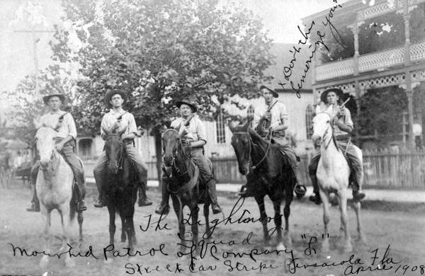 Patrolmen with guns on horses : Pensacola, Florida.