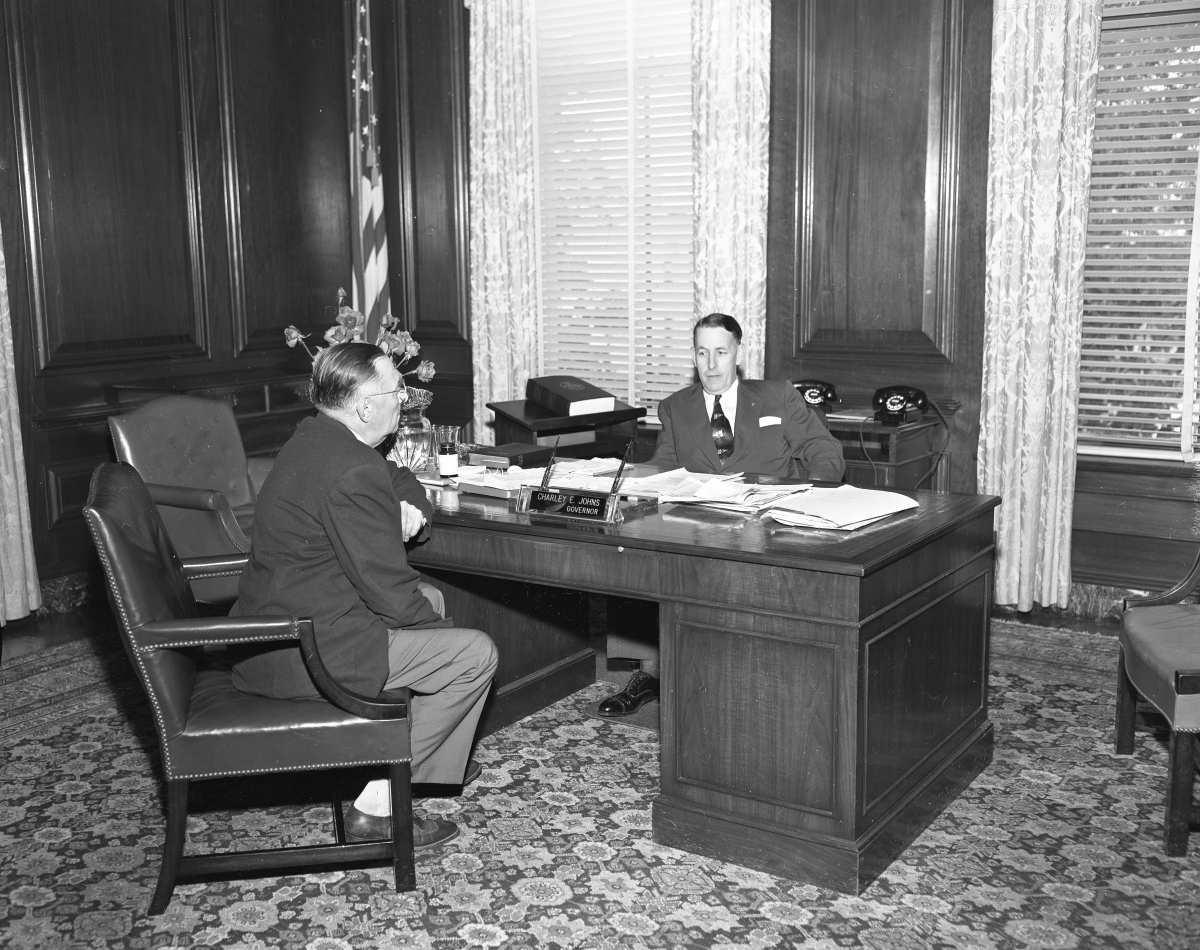 Governor Charley Johns in his office