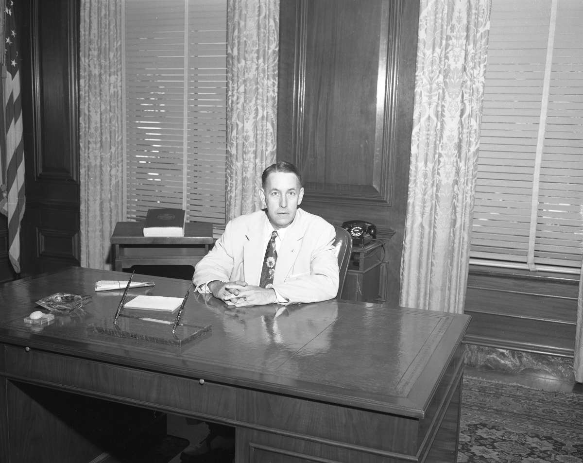 Governor Charley Johns in his office