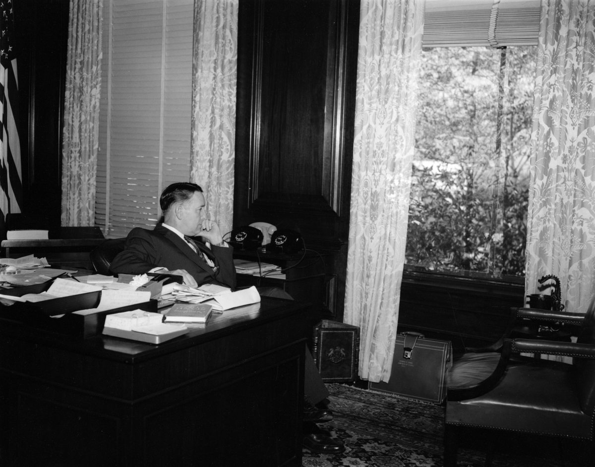 Governor Charley Johns in his office