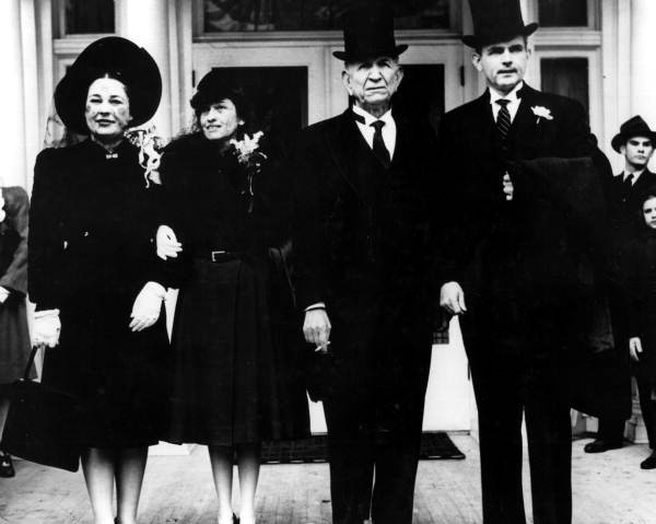 Governor Cone leaving the mansion with future governor Spessard Lindsey Holland