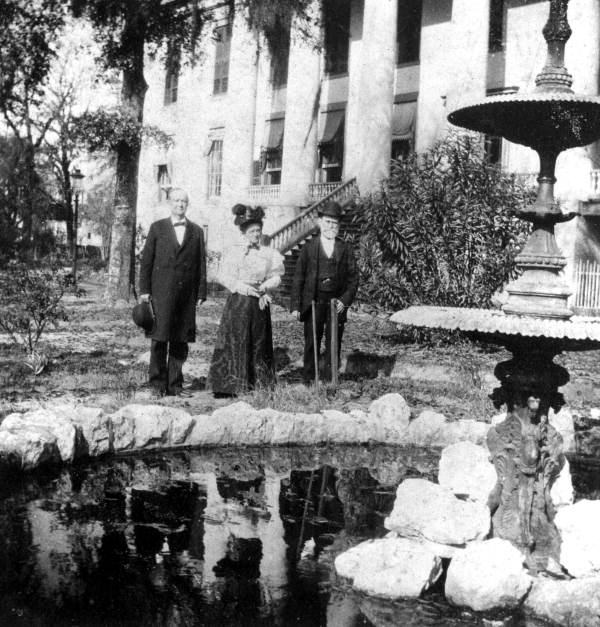 Governor Bloxham and unidentified couple on the capitol grounds - Tallahassee, Florida