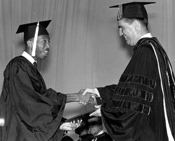 Max Courtney receiving his Bachelor's degree from Florida State University president John E. Champion