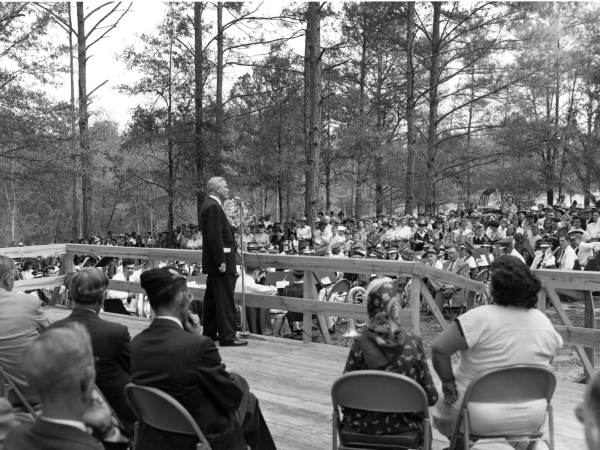 Fuller Warren addressing audience at dedication of new highway bridge.
