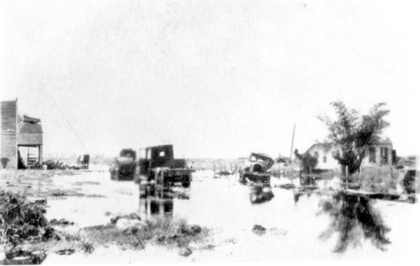 View of Avenue "A", flooded after the hurricane of 1928 - Belle Glade, Florida