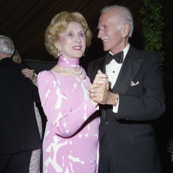 Estee Lauder dancing with fashion designer Philip Hulitar during 50th anniversary benefit for the Society of the Four Arts.