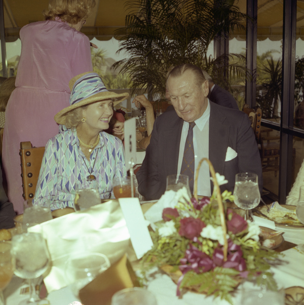 Mrs. Stewart Iglehart dining with Winston F.C. Guest at the Palm Beach Polo and Country Club in Wellington.