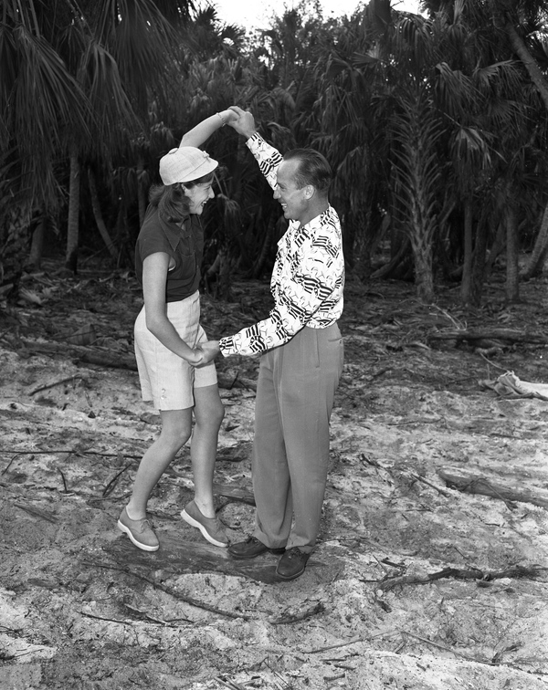 Mr. & Mrs. Roland R. Comerford dancing at the Colony Hotel outdoor party in Palm Beach.