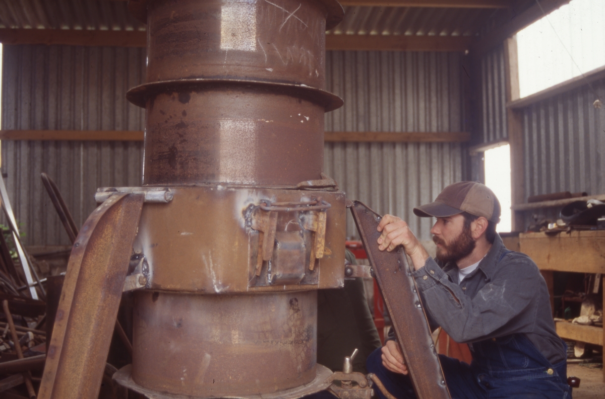 FSU student John Raulerson checking leg supports during fabrication of furnace in Wales.