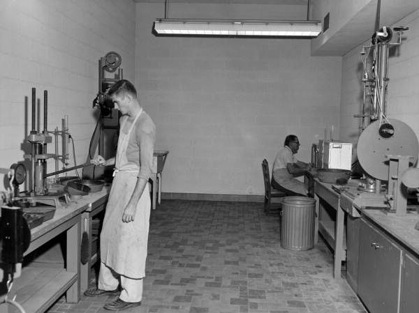 Unidentified men in the Bearing Value and Compaction Room - Gainesville, Florida