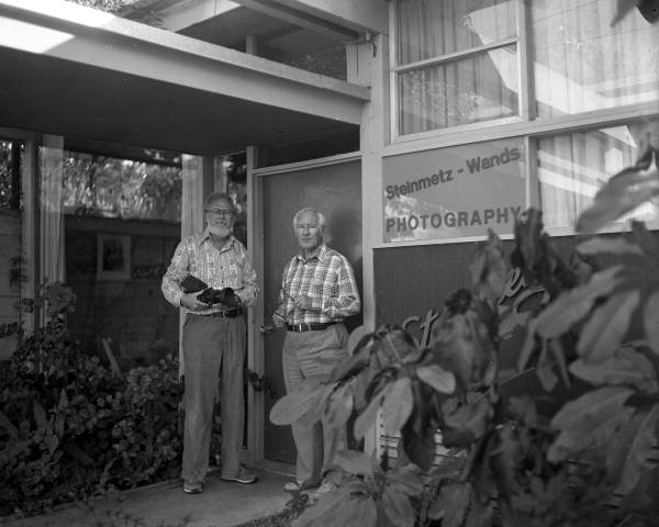 Joe Steinmetz and Bob Wands in front of their photography studio in Sarasota, Florida.