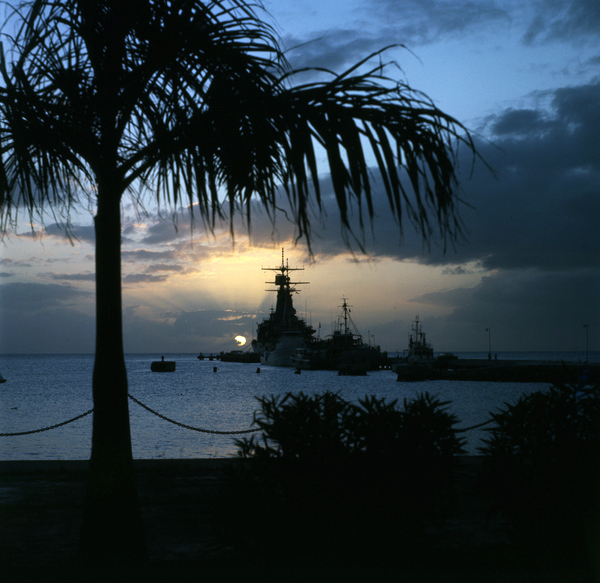 Silhouettes of ships shown during sunset in Sarasota, Florida.