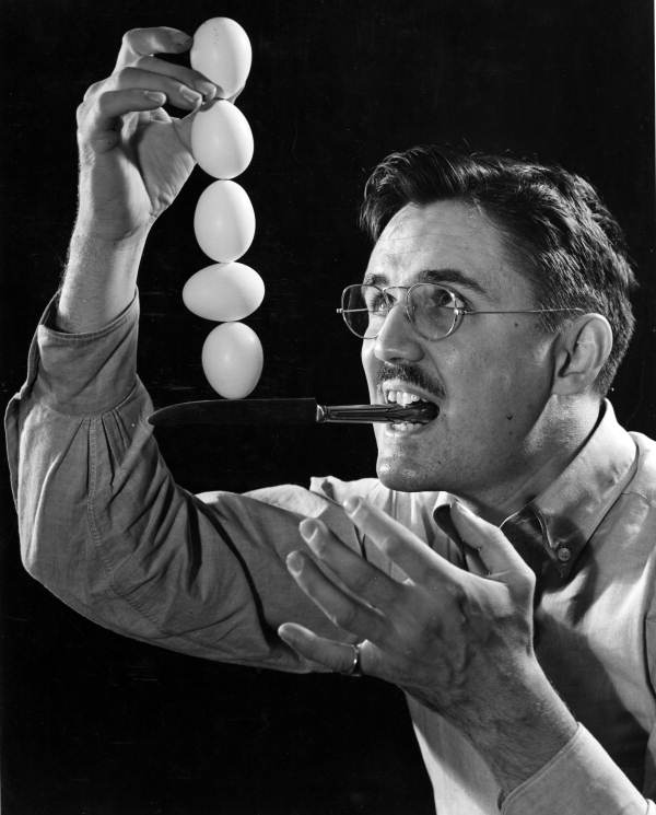 Joe Steinmetz doing an egg balancing act on the edge of a knife.