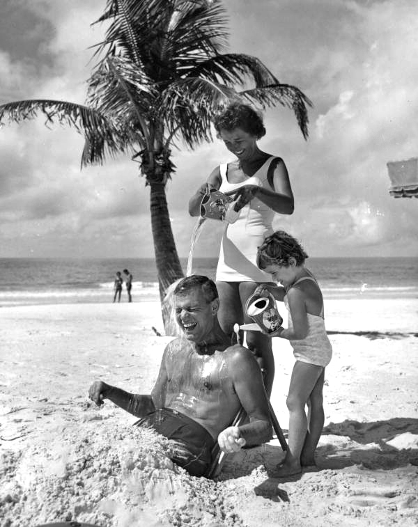 Family having fun at the beach in Sarasota, Florida.