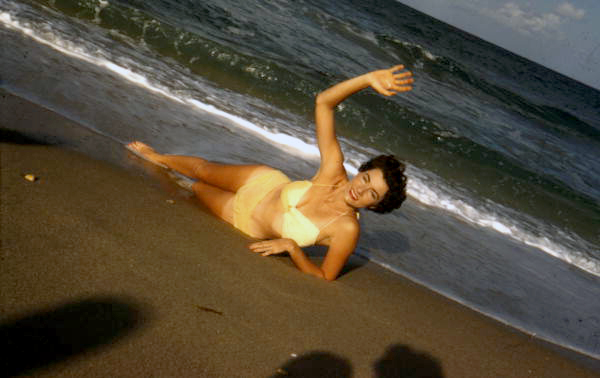 View showing a model at the seashore on the beach in Sarasota, Florida.