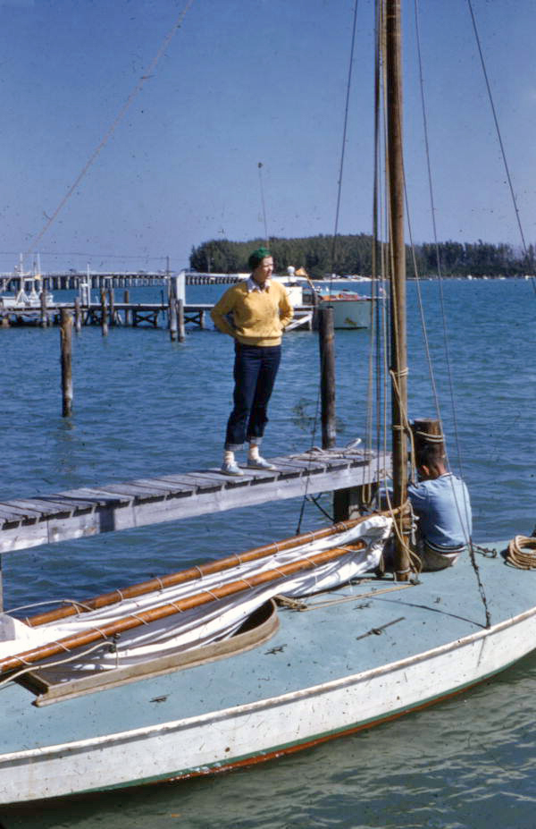 People with their sailboat at a city dock in Sarasota, Florida.