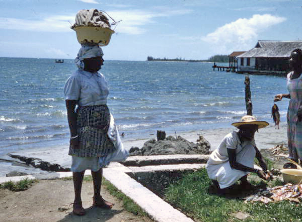 Women cleaning fish in Nassau, Bahamas.