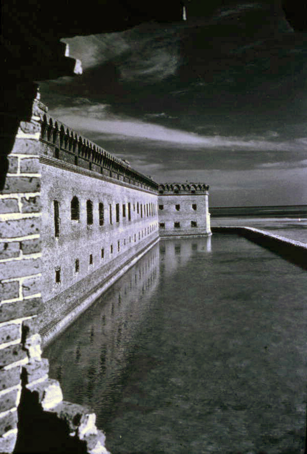 Exterior view showing Ft. Jefferson's moat, wall, and bastion on Garden Key in the Dry Tortugas.