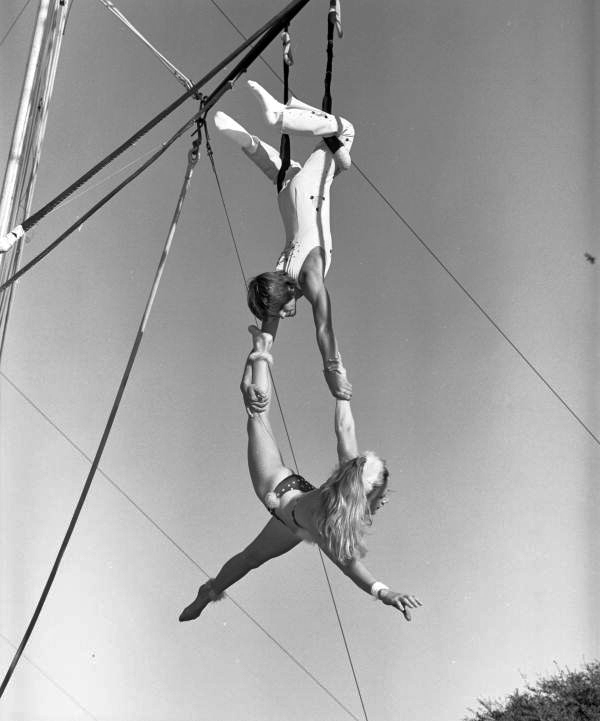 View of young people on the trapeze at the Sarasota High School Sailor Circus.