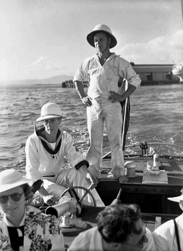 Boat captain bringing tourists to port from passenger ship at Jamaica.