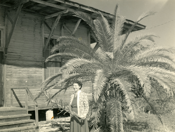 Koreshan Unity president Hedwig Michel standing by Art Hall at the Koreshan State Historic Site park in Estero, Florida.