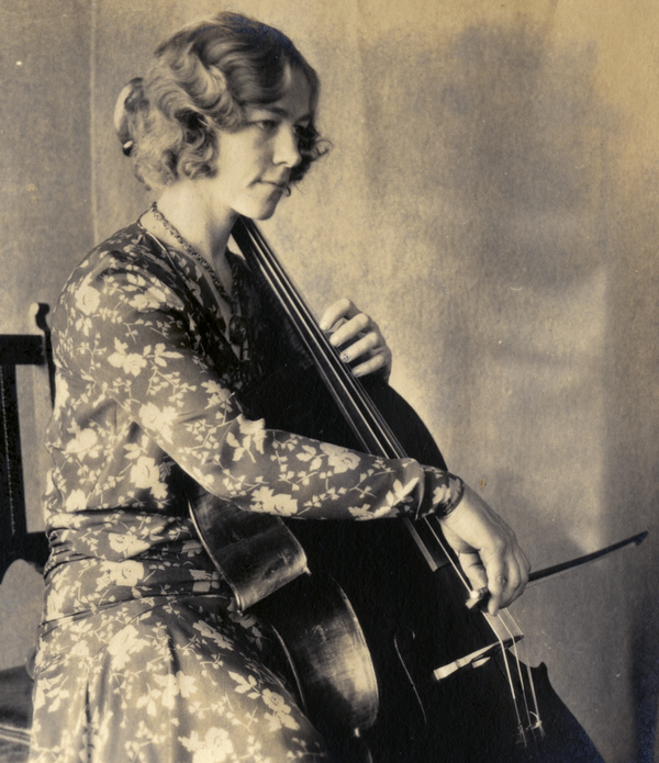 Christmas card with portrait of Koreshan Rosalie McCready and her cello.
