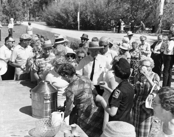 Visitors at the Koreshan State Historic Site park refreshment table on day of dedication.