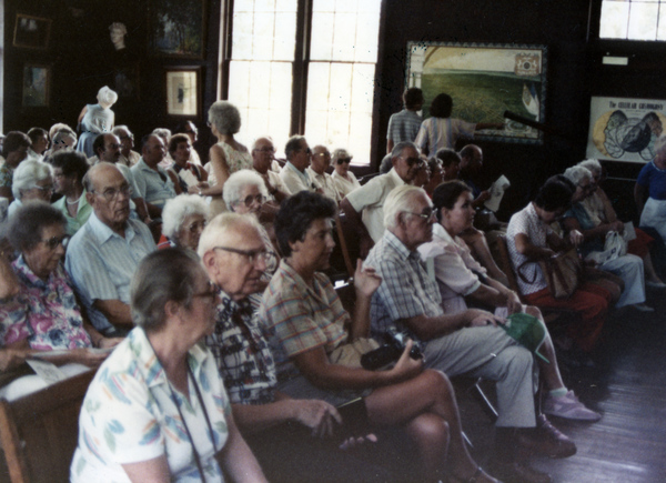 Audience in Art Hall at the Koreshan State Historic Site park in Estero, Florida.