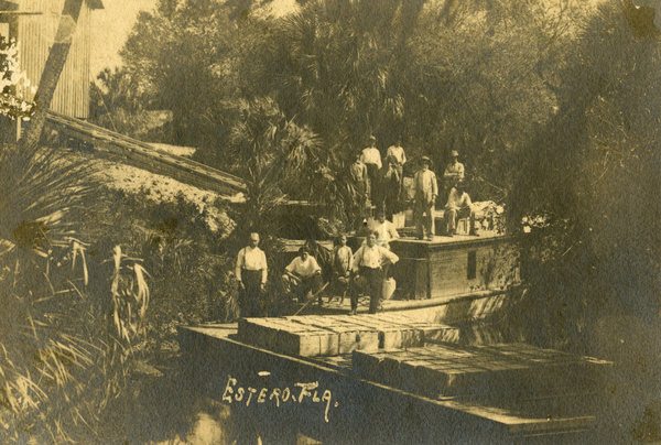 Koreshans loading boats on the Estero River.