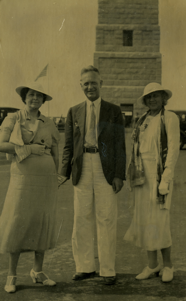 Portrait of Koreshan Claude Rahn with women at the Pilgrim Memorial Monument in Provincetown, Massachusetts.