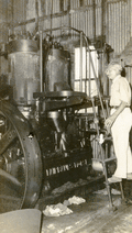 Alfred Christensen viewing machinery in the power plant at the Koreshan Unity in Estero, Florida.
