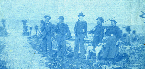 Koreshans posing with guns in Naples, Florida.